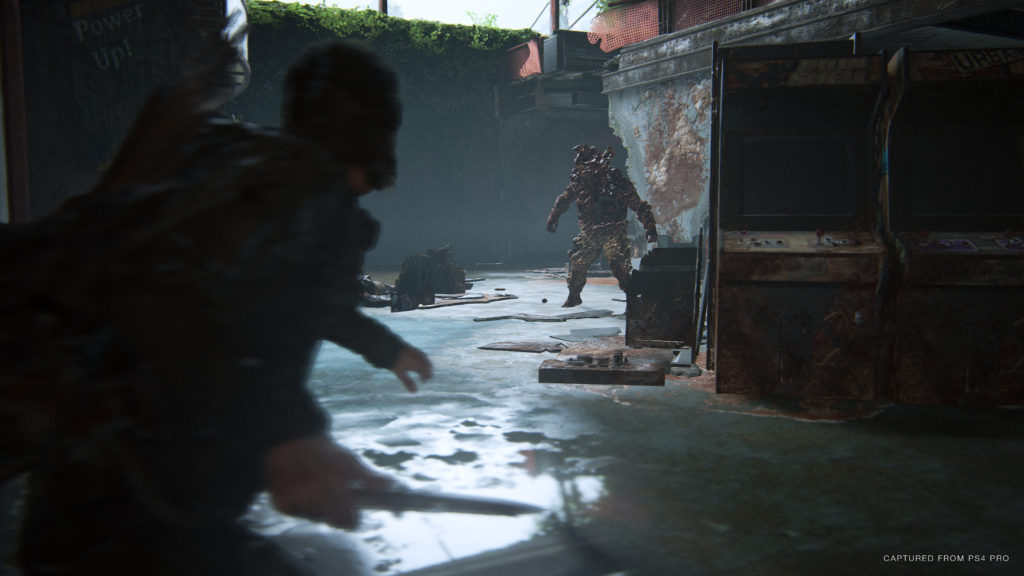 Ellie approaches a shambler TLOU2